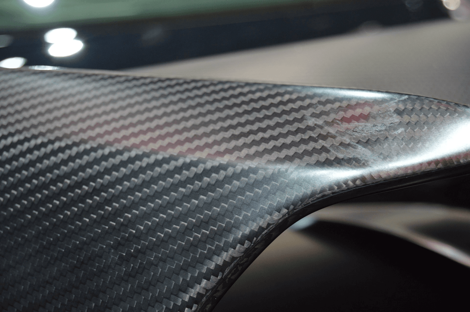 Bentley carbon hood used as a visual for KICKBACK marketplace terms